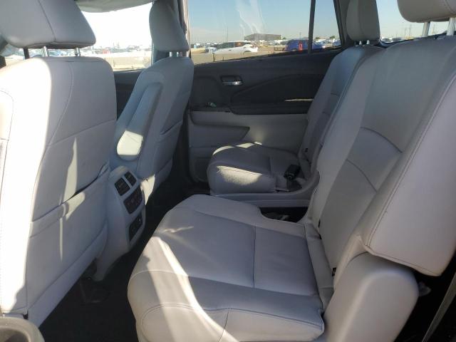 Photo 11 from auction – 2021 HONDA PILOT TOURING with VIN 5FNYF6H67MB034473