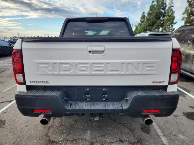 Photo 6 from auction – 2025 HONDA RIDGELINE with VIN 5FPYK3F12SB001855
