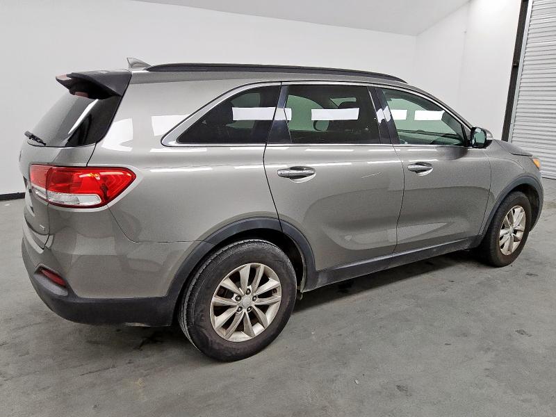 Photo 3 from auction – 2016 KIA SORENTO LX with VIN 5XYPG4A33GG066248