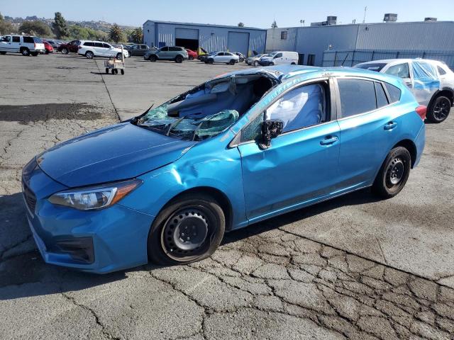 SUBARU IMPREZA 2018 with VIN 4S3GTAA66J3743454 - Photo from auction
