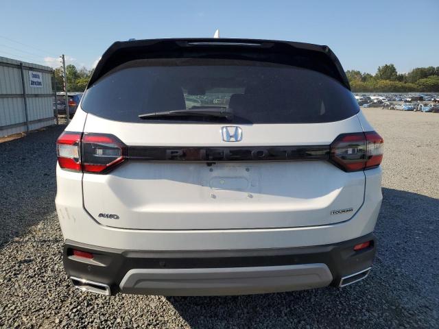 Photo 6 from auction – 2025 HONDA PILOT TOURING with VIN 5FNYG1H76SB044787