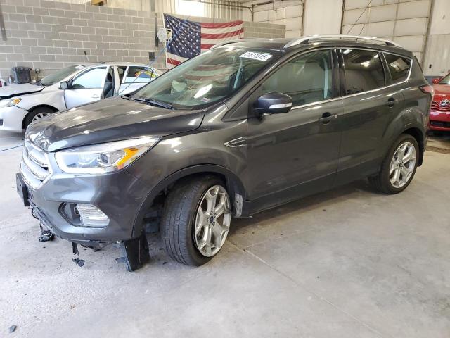FORD ESCAPE TIT 2018 with VIN 1FMCU9J99JUC86391 - Photo from auction