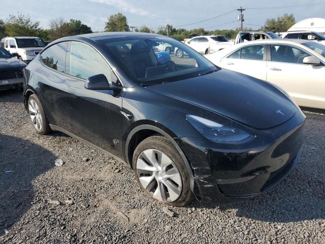 Photo 4 from auction – 2023 TESLA MODEL Y with VIN 7SAYGAEE5PF930399