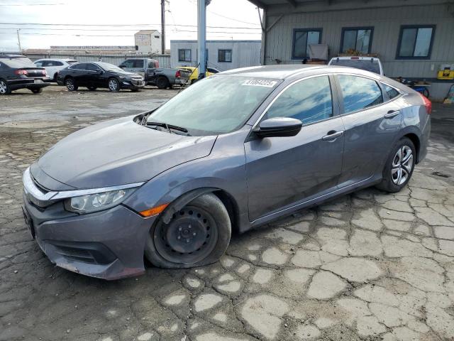 HONDA CIVIC LX 2016 with VIN 2HGFC2F57GH539870 - Photo from auction