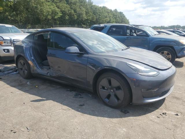 Photo 4 from auction – 2022 TESLA MODEL 3 with VIN 5YJ3E1EB5NF184052