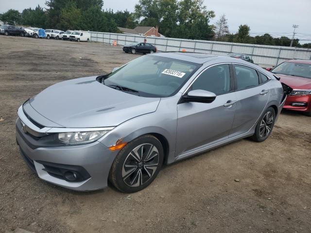 HONDA CIVIC EX 2017 with VIN 19XFC1F31HE213695 - Photo from auction