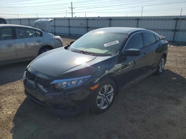 HONDA CIVIC LX 2018 with VIN 19XFC2F59JE032633 - Photo from auction