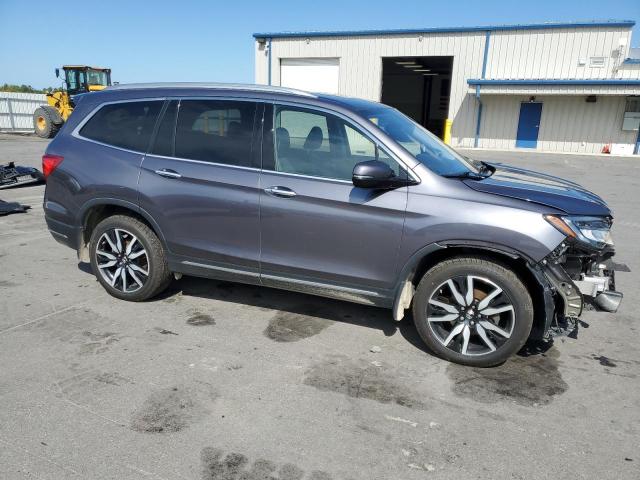 Photo 4 from auction – 2021 HONDA PILOT ELIT with VIN 5FNYF6H03MB021215