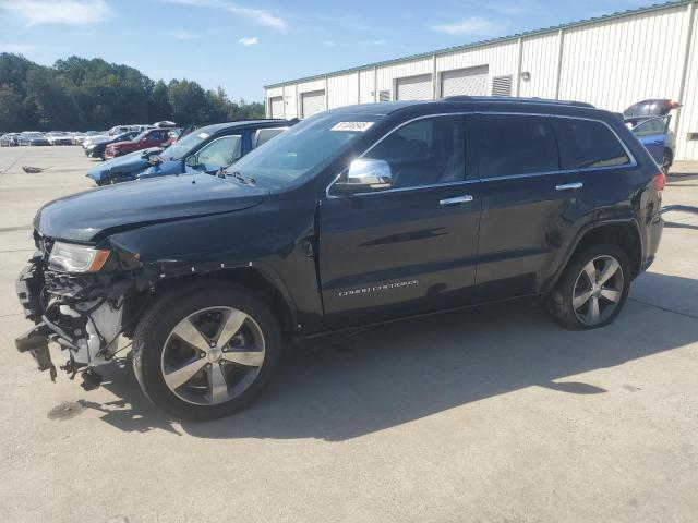 JEEP GRAND CHER 2014 with VIN 1C4RJECG6EC348224 - Photo from auction