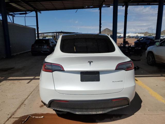 Photo 6 from auction – 2023 TESLA MODEL Y with VIN 7SAYGDEE8PA116844