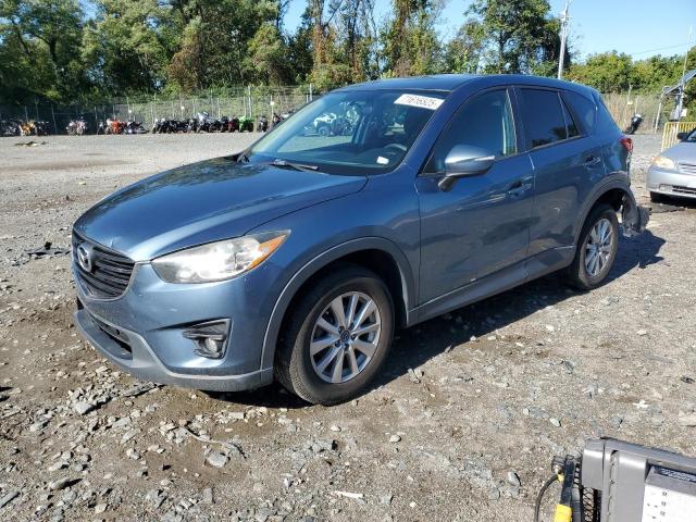 MAZDA CX-5 TOURI 2016 with VIN JM3KE2CY9G0743412 - Photo from auction