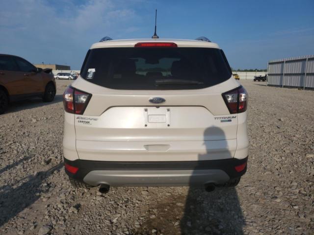 Photo 6 from auction – 2018 FORD ESCAPE TIT with VIN 1FMCU9J95JUD03509