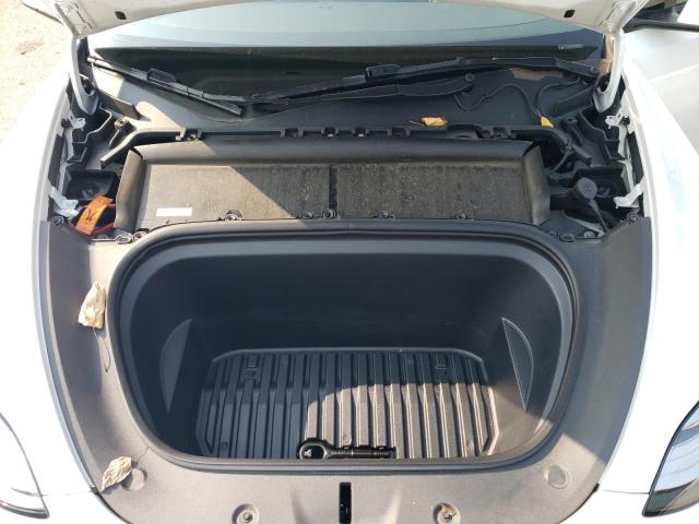 Photo 12 from auction – 2023 TESLA MODEL Y with VIN 7SAYGDEE0PA067140