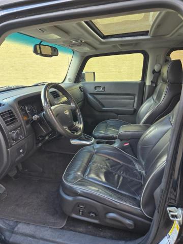Photo 5 from auction – 2009 HUMMER H3 ALPHA with VIN 5GTEN13L898106867