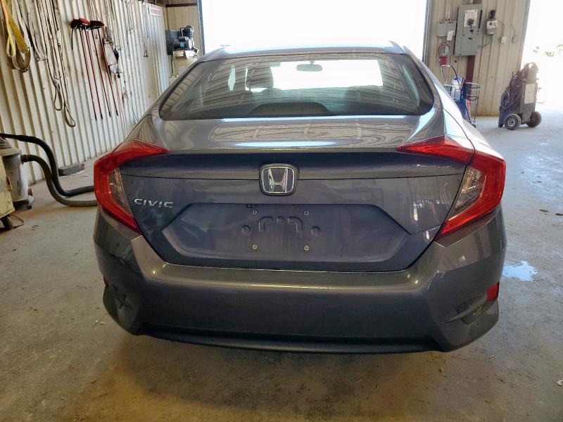 Photo 6 from auction – 2018 HONDA CIVIC LX with VIN 2HGFC2F59JH504450