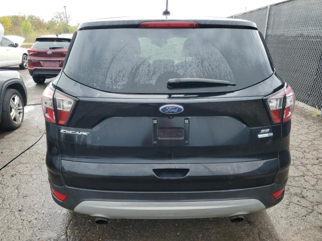 Photo 6 from auction – 2017 FORD ESCAPE SE with VIN 1FMCU9G99HUC40755