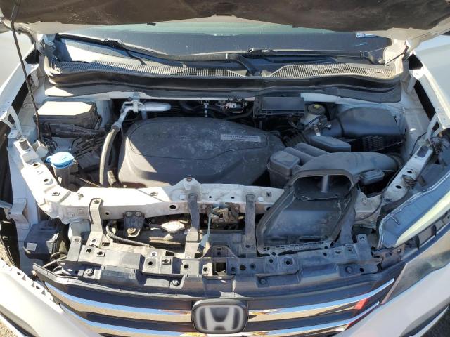 Photo 12 from auction – 2018 HONDA PILOT EXL with VIN 5FNYF5H63JB016641