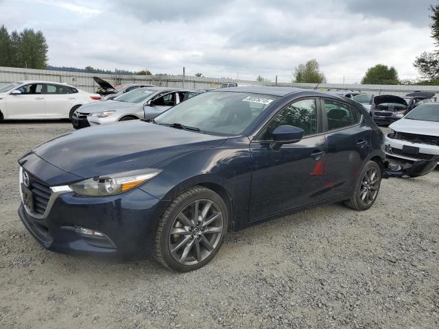 MAZDA 3 TOURING 2018 with VIN 3MZBN1L30JM162485 - Photo from auction