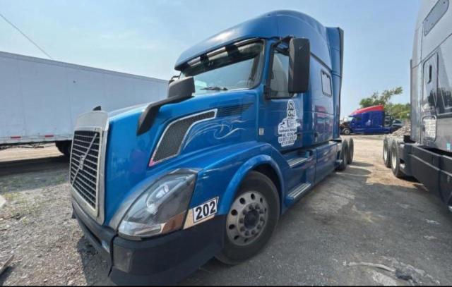 Photo 2 from auction – 2015 VOLVO VN VNL with VIN 4V4NC9EH7FN180321