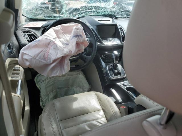 Photo 8 from auction – 2014 FORD ESCAPE TIT with VIN 1FMCU9J93EUB69704