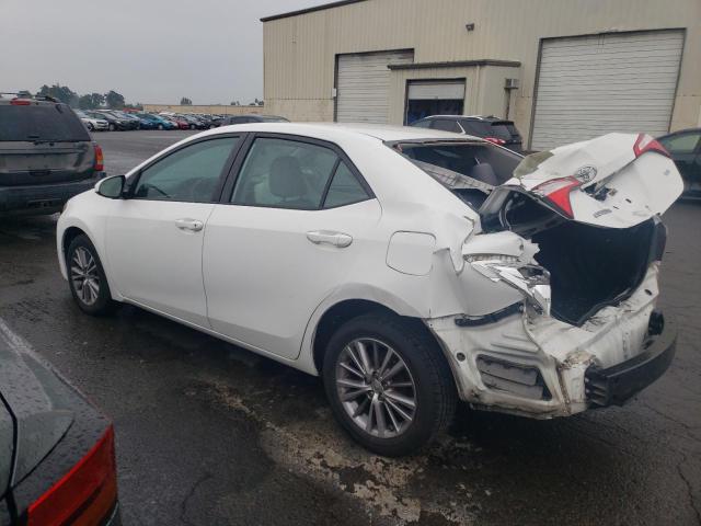 Photo 2 from auction – 2015 TOYOTA COROLLA L with VIN 5YFBURHE0FP193511