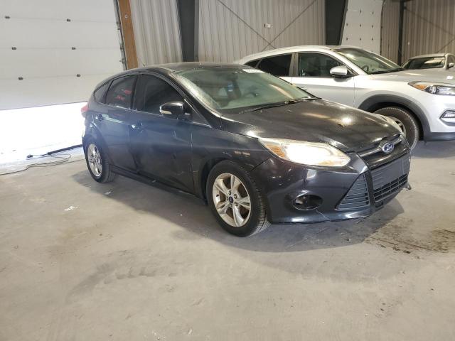 Foto 4 de la subasta – 2014 FORD FOCUS SE con VIN 1FADP3K20EL306401