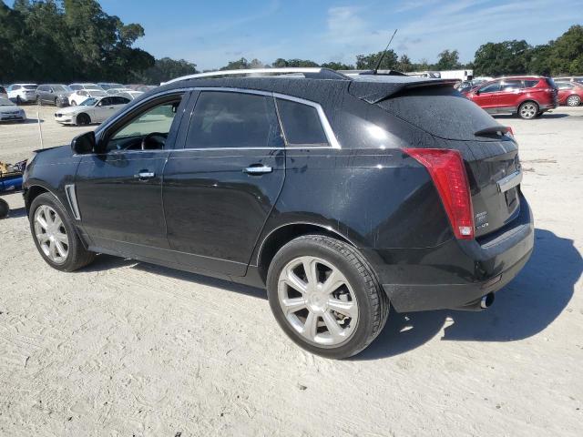 Photo 2 from auction – 2014 CADILLAC SRX PERFOR with VIN 3GYFNCE33ES664948