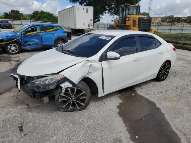 TOYOTA COROLLA L 2017 with VIN 5YFBURHE4HP607666 - Photo from auction