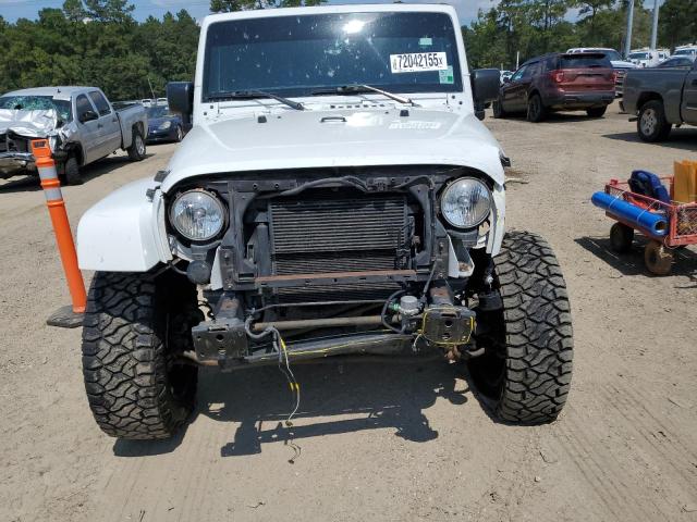 Photo 5 from auction – 2016 JEEP WRANGLER U with VIN 1C4BJWEGXGL154948