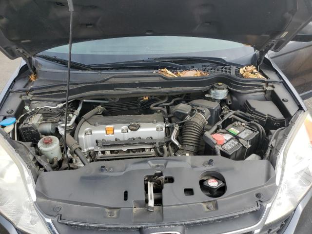 Photo 11 from auction – 2011 HONDA CR-V SE with VIN JHLRE3H45BC014384
