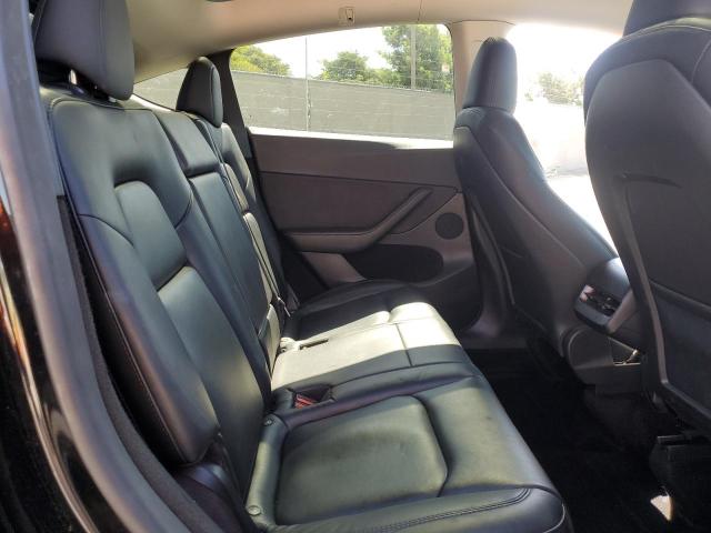 Photo 11 from auction – 2023 TESLA MODEL Y with VIN 7SAYGDEE9PF928625