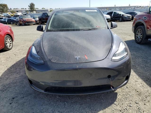 Photo 5 from auction – 2023 TESLA MODEL Y with VIN 7SAYGAEE7PF711251