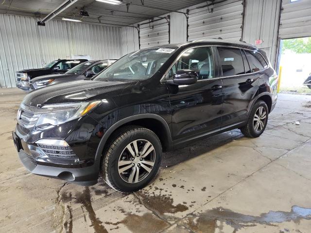 HONDA PILOT EXL 2018 with VIN 5FNYF6H56JB012872 - Photo from auction