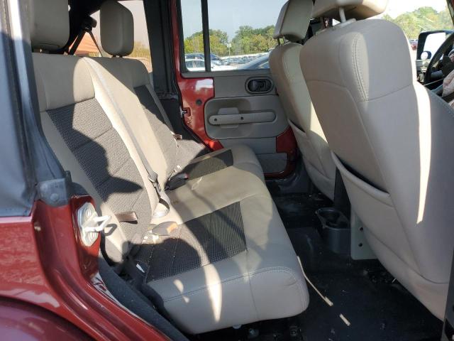 Photo 10 from auction – 2010 JEEP WRANGLER U with VIN 1J4BA5H11AL128127