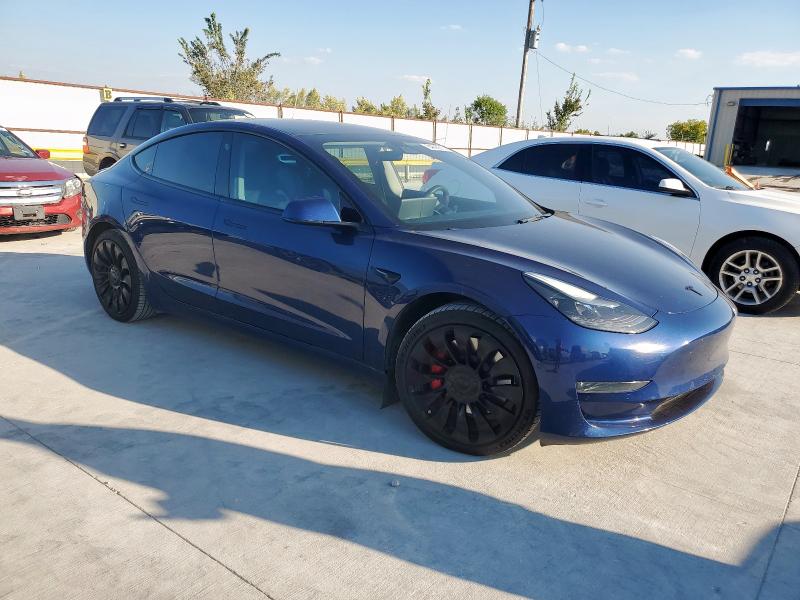 Photo 4 from auction – 2022 TESLA MODEL 3 with VIN 5YJ3E1EC6NF110082