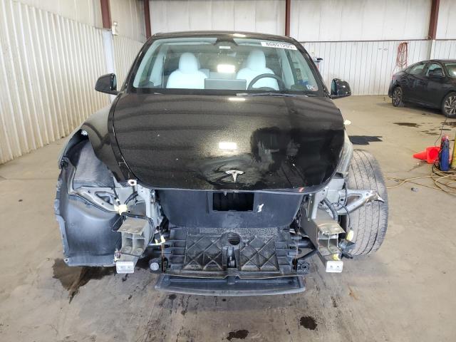 Photo 5 from auction – 2023 TESLA MODEL Y with VIN 7SAYGAEE4PF803482