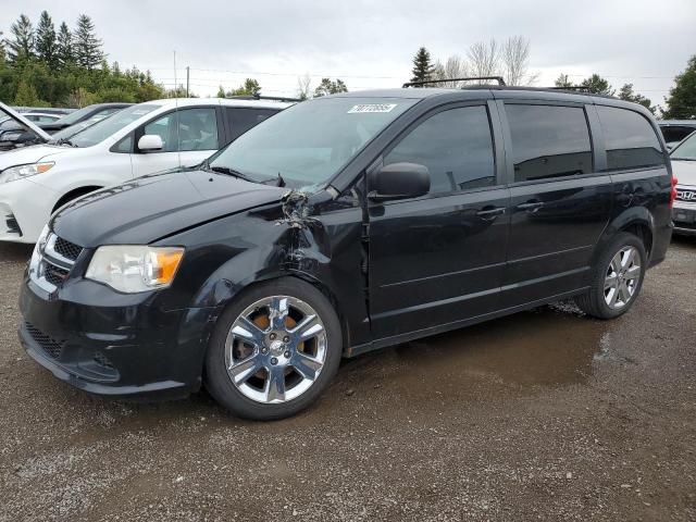 DODGE GRAND CARA 2014 with VIN 2C4RDGBG3ER283148 - Photo from auction