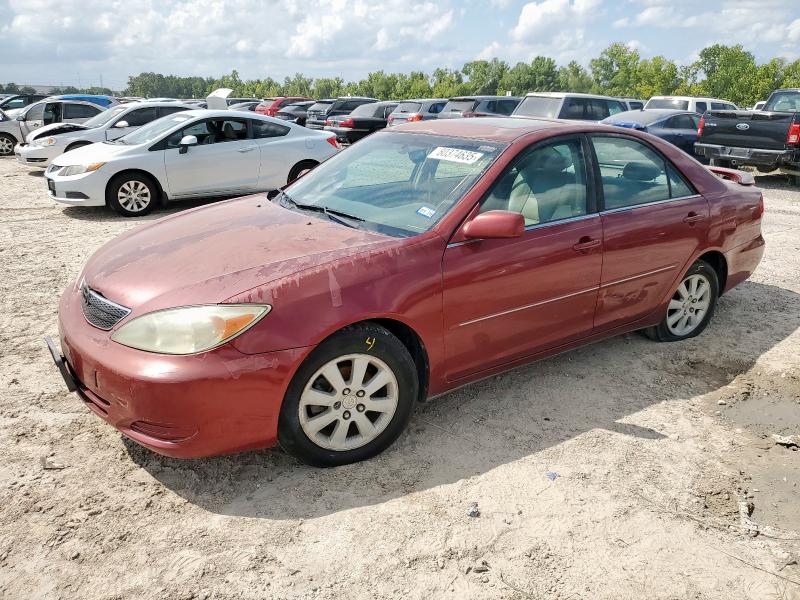 TOYOTA CAMRY LE 2002 with VIN 4T1BE32K32U107240 - Photo from auction