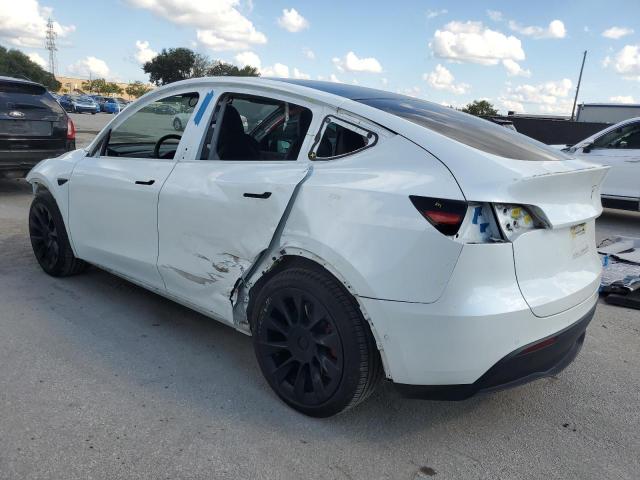 Photo 2 from auction – 2021 TESLA MODEL Y with VIN 5YJYGDEE9MF209321