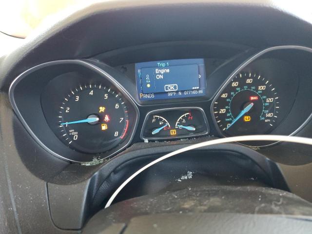 Photo 9 from auction – 2014 FORD FOCUS with VIN 1FADP3F21EL111434