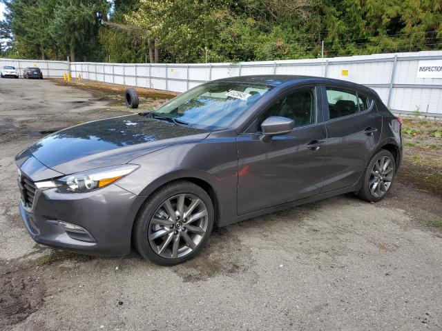 MAZDA 3 TOURING 2018 with VIN 3MZBN1L38JM167059 - Photo from auction