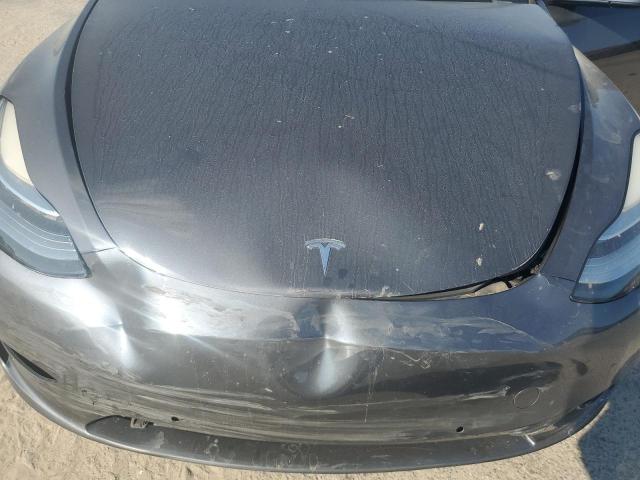 Photo 11 from auction – 2022 TESLA MODEL Y with VIN 7SAYGDEE3NF423516