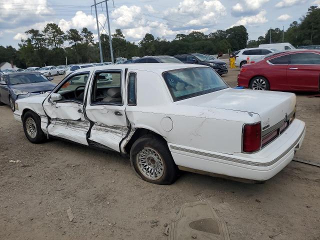 Photo 2 from auction – 1997 LINCOLN TOWN CAR E with VIN 1LNLM81W8VY668653