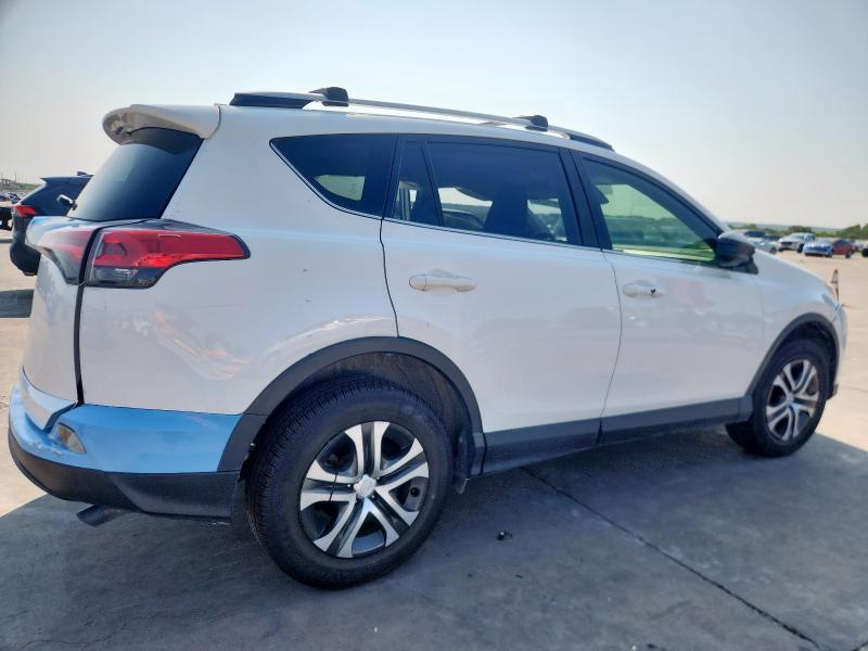 Photo 3 from auction – 2018 TOYOTA RAV4 LE with VIN JTMZFREV2JJ161704