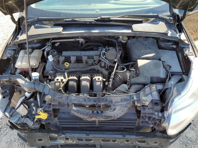 Photo 11 from auction – 2014 FORD FOCUS SE with VIN 1FADP3K24EL299923