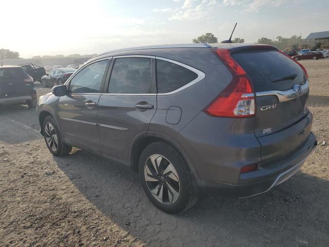 Photo 2 from auction – 2015 HONDA CR-V TOURI with VIN 5J6RM4H92FL086046