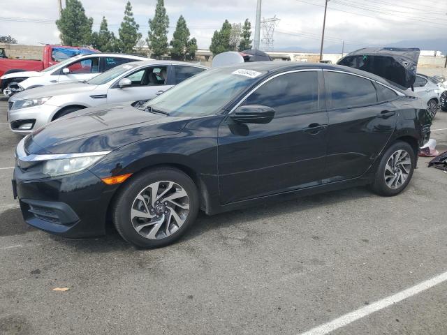 HONDA CIVIC EX 2018 with VIN 2HGFC2F76JH546494 - Photo from auction