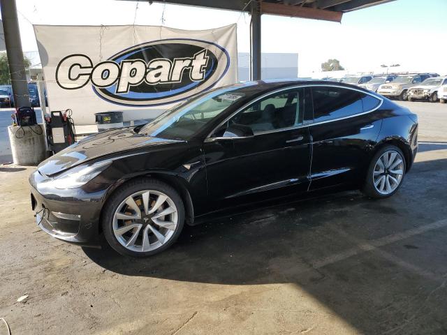 TESLA MODEL 3 2018 with VIN 5YJ3E1EB7JF186671 - Photo from auction