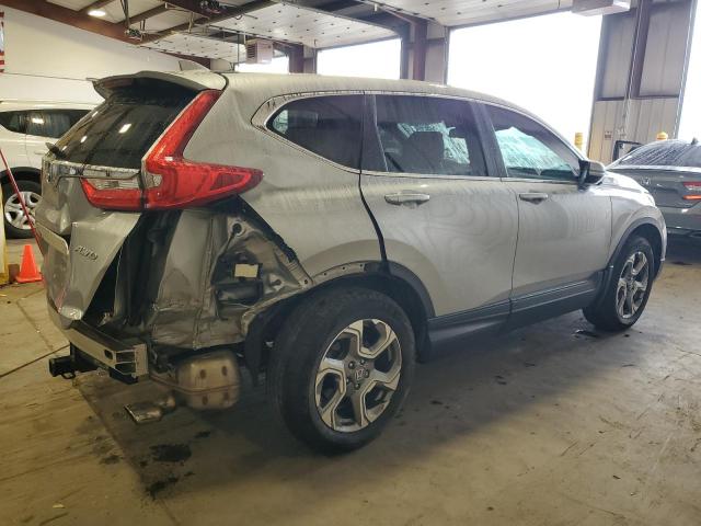 Photo 3 from auction – 2018 HONDA CR-V with VIN 2HKRW2H87JH628119