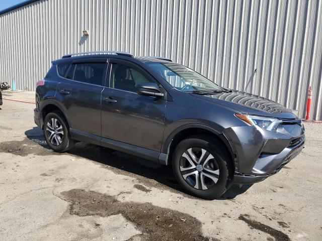 Photo 4 from auction – 2016 TOYOTA RAV4 LE with VIN JTMZFREV8GJ090551